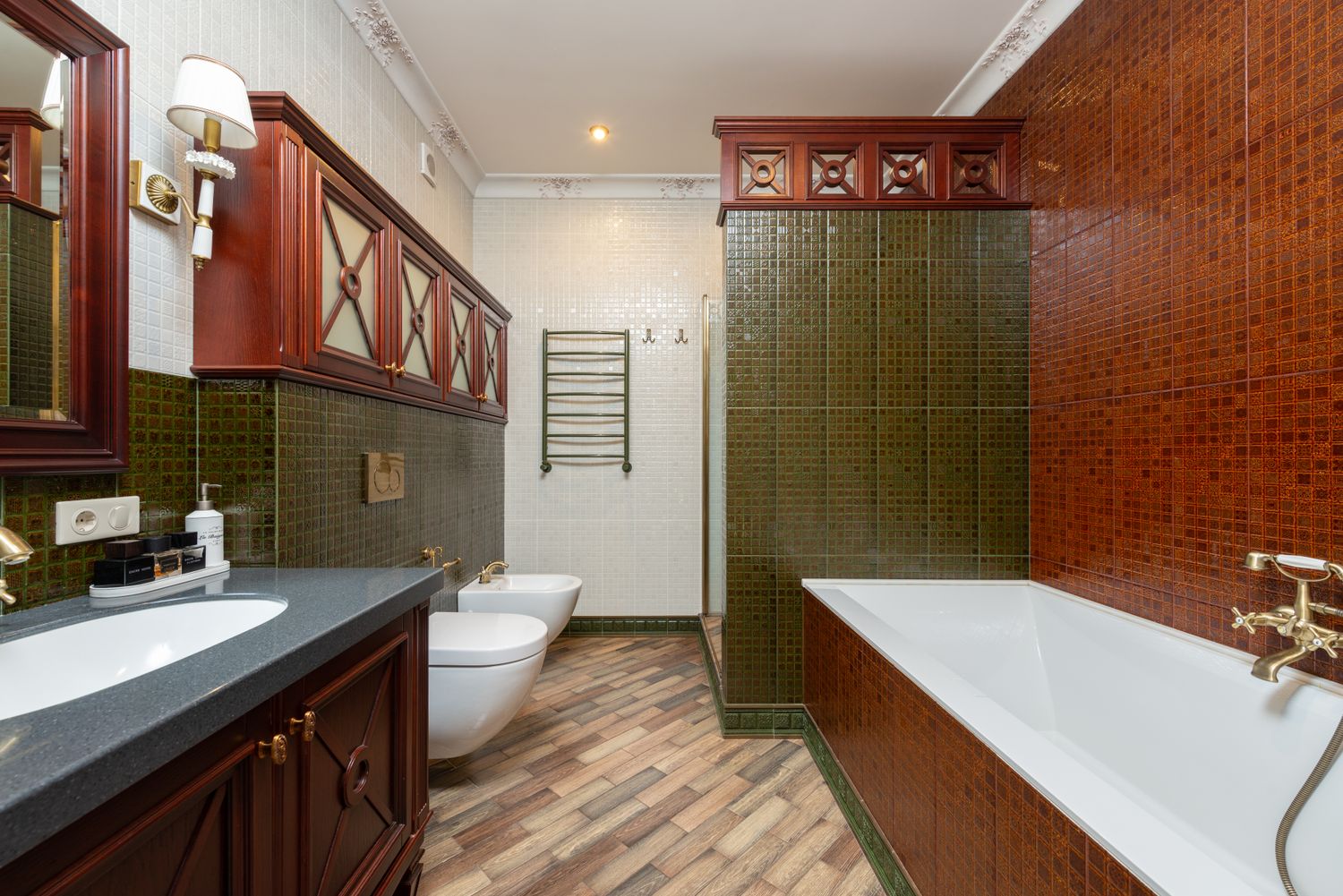 Detail of a richly colored powder room by Reynolds Interior Design