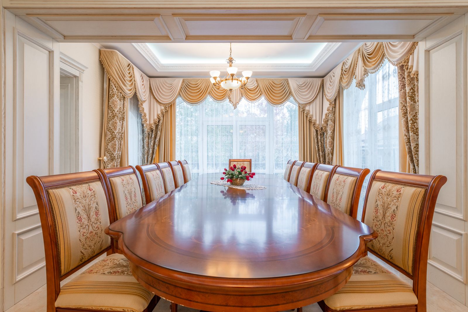Elegant dining room framed by French doors