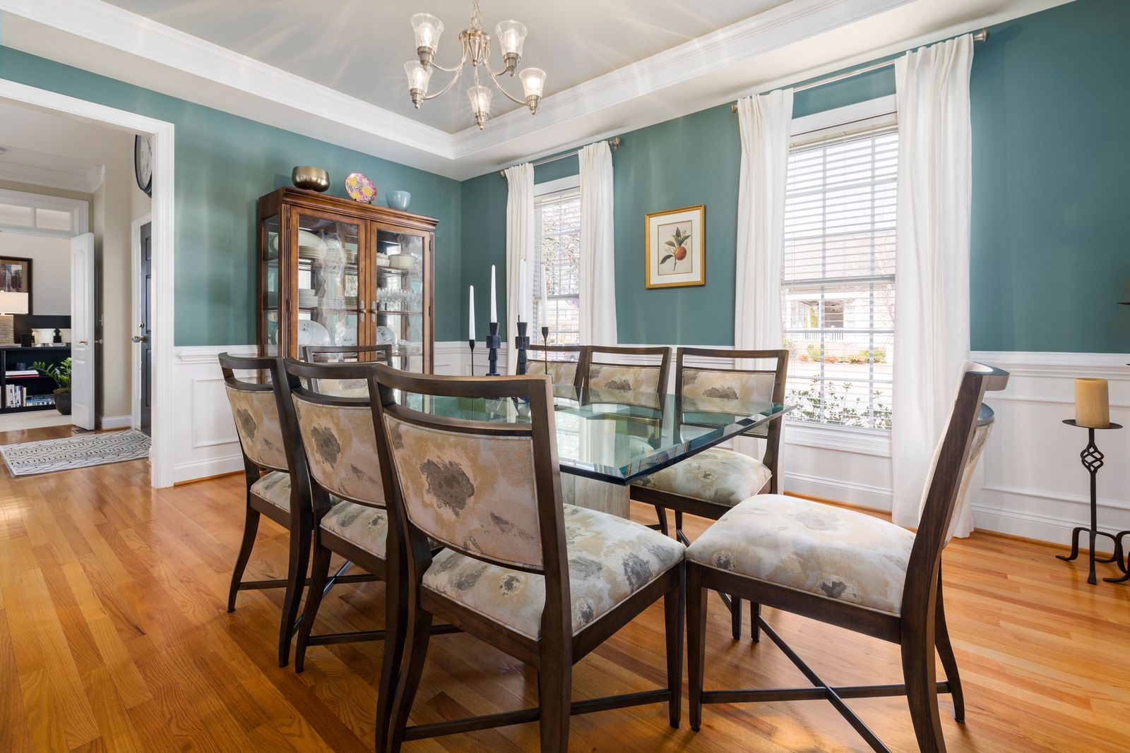 Moody heritage-green dining room by Reynolds Interior Design