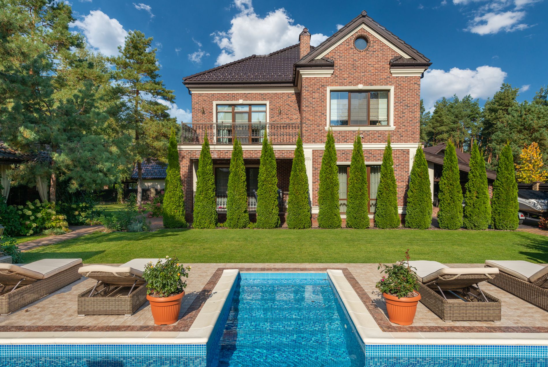 Brick estate with pool, a Dallas-area home