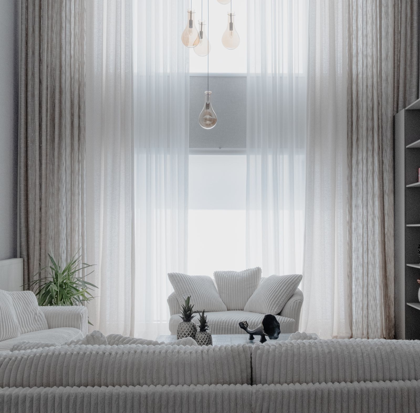 Bright, freshly staged living room in soft neutral tones